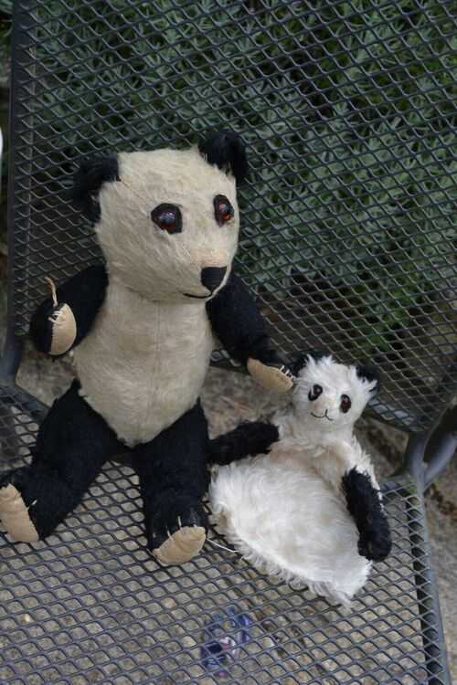 Really cute Antique 'panda bear' soft toy and straw filled panda puppet glass eyes