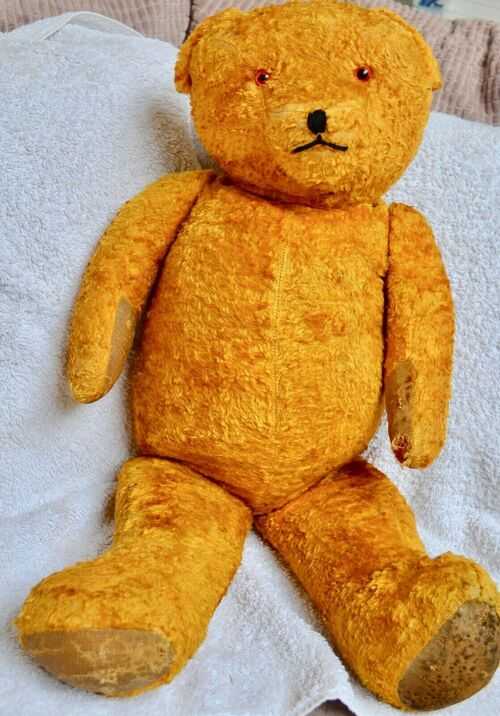 ANTIQUE LARGE STRAW FILLED TEDDY BEAR