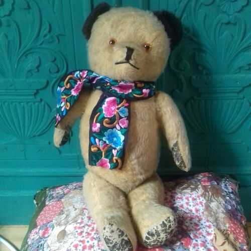 Antique vintage teddy bear in need of home