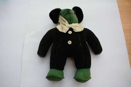 Old green and black velvet teddy bear.