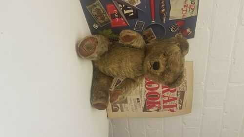 vintage jointed teddy bear straw filled