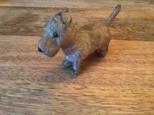 A vintage miniature toy dog