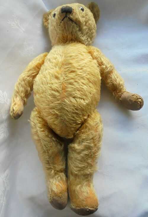 Antique Large Hard Stuffed Teddy Bear. Glass Eyes Moving Arms and Legs.