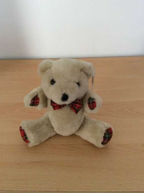 Jointed Teddy (new with tag) approx 20cm