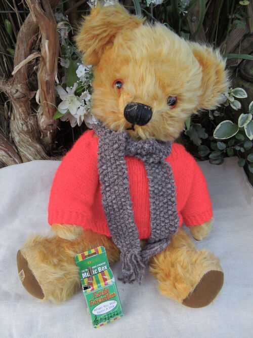 Vintage Merrythought musical bear with label