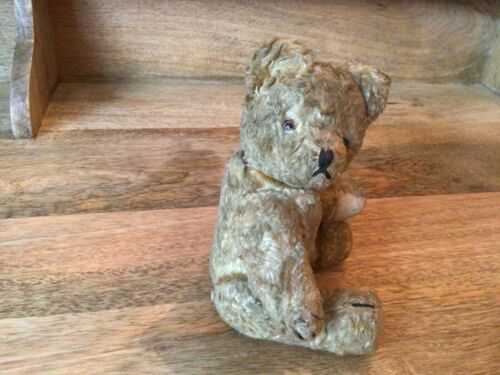 A vintage small bear looking for a new home