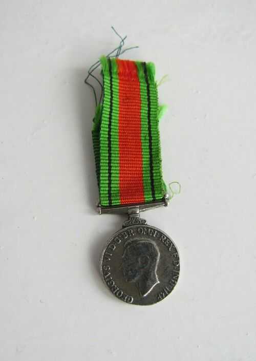 RARE WORLD WAR II DEFENCE MEDAL FOR ANTIQUE TEDDY BEARS