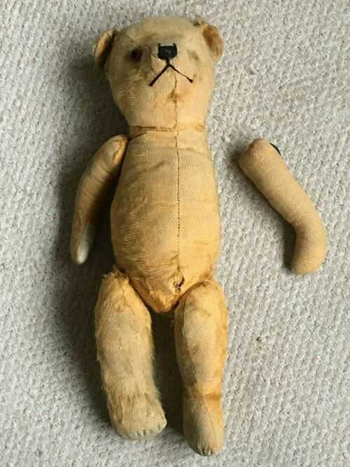 Very old Teddy Bear, one-eyed, one and a bit armed, odd legs ? Clearance find.