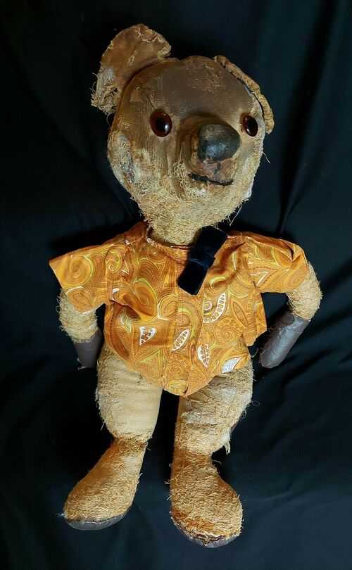 ANTIQUE UNMARKED TEDDY BEAR ( OVERALL DAMAGE ) 56 CM HIGH.