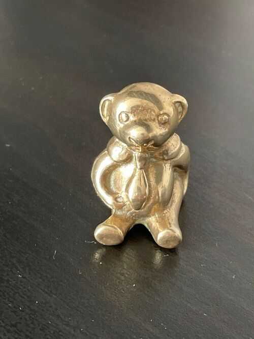 Antique brass tiny teddy bear