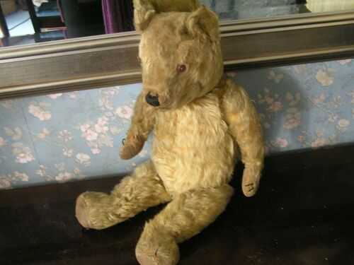 ANTIQUE BLONDE MOHAIR JOINTED TEDDY BEAR WITH LONG LIMBS AND HUMP c 1920