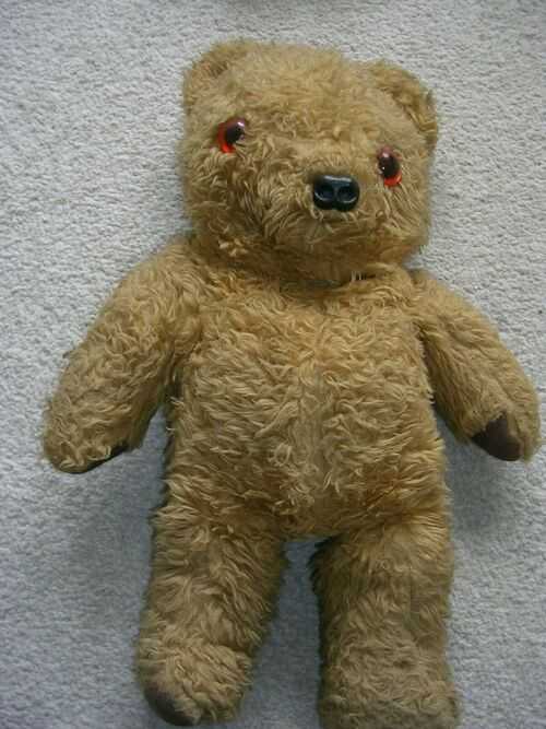 A VINTAGE  TEDDY BEAR.