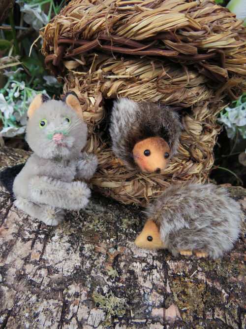 Vintage Schuco miniature animals - cat and hedgehogs