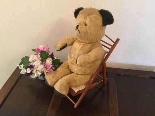 VINTAGE STRAW FILLED SOOTY STYLE TEDDY BEAR WITH DECKCHAIR, and GROWLER.NEEDS TLC.