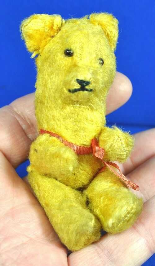 Early hard fill small 4 inch Teddy Bear glass eyes and posable