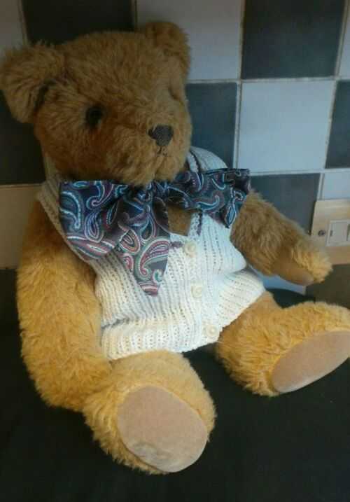 vintages OLD TEDDY BEAR, JOINTED.  name  on tag olly,s  teddies
