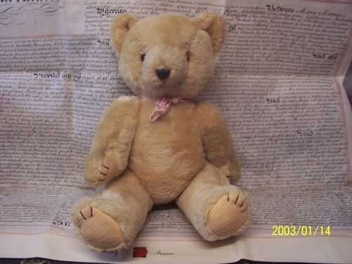 A vintage teddybear.  chinease label.  pure wool. 1960,s. 15ins tall.
