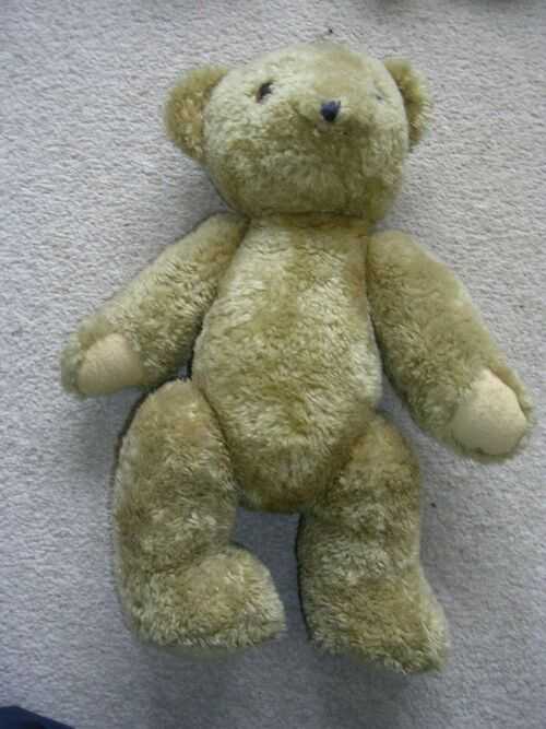 A VINTAGE JOINTED  TEDDY BEAR.